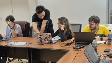 Debugging together, late in the day