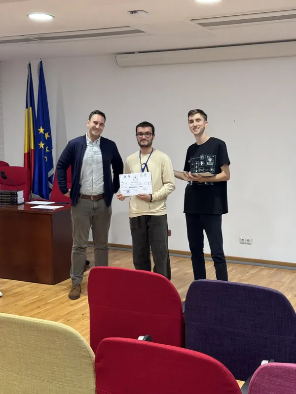 A winning team with their diploma